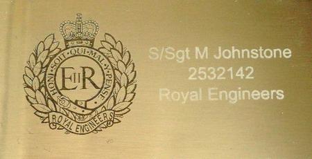 7.5 cm by 4 cm engraved plaque