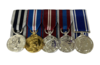 Queen`s Police Medal + QGJM + QDJM + QPJM + POLICE LS&GC Miniature Court Mounted Set